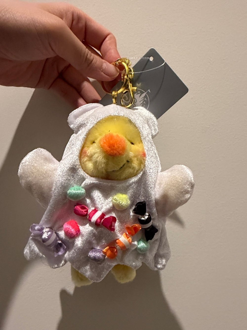 Disney Yellow Chick Plush Keychain with White Costume and Colorful Candy Accents